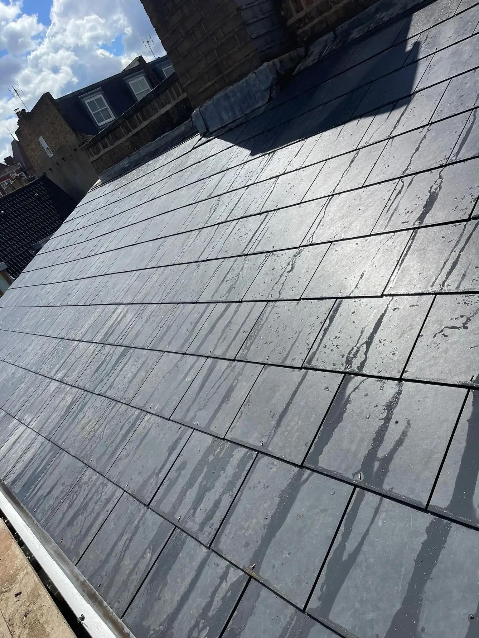 Newly slated roof on a London terrace completed by Swift Fix London