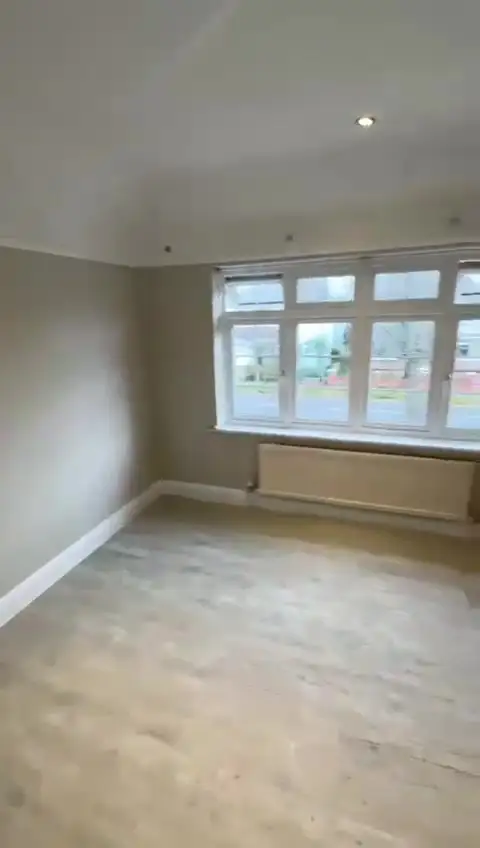 First-floor room with new LVT flooring and freshly painted walls